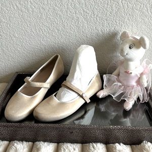 Elegant girl dress up shoes. Real leather, glitter gold color.